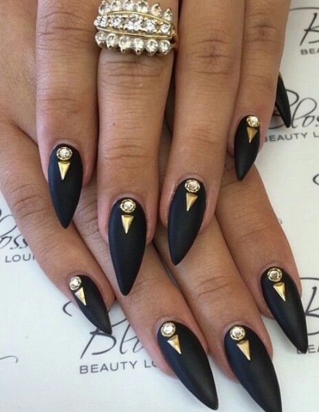 women's black and gold nails
