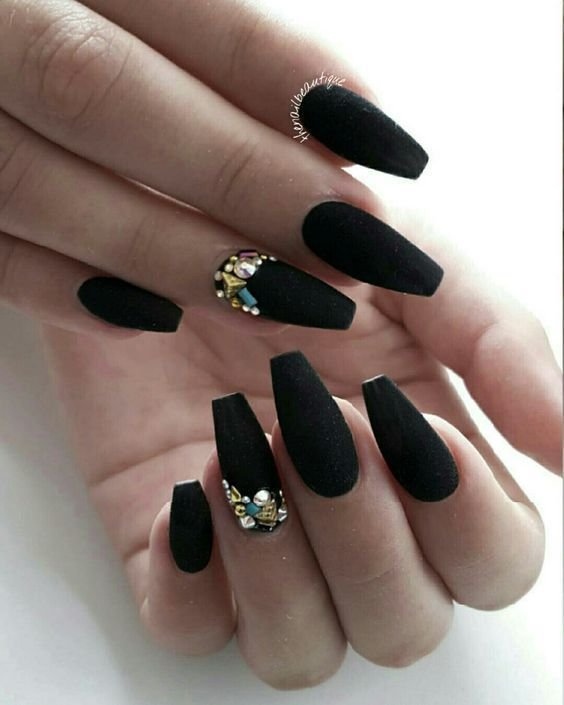 women's black and gold nails