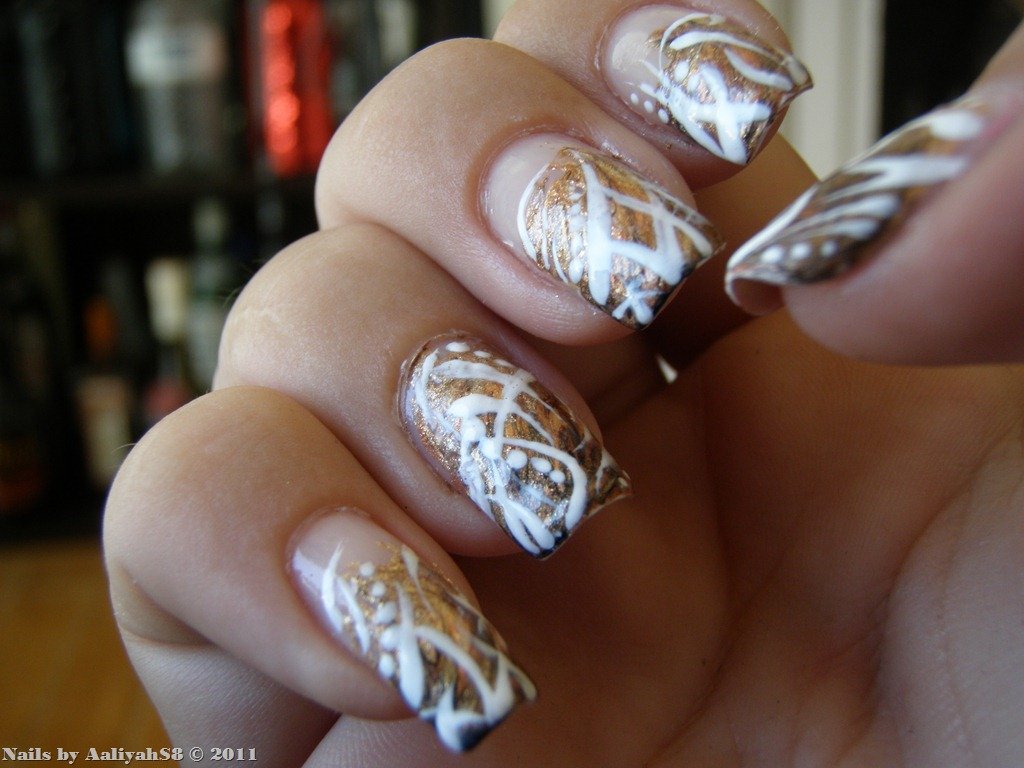 women's white and gold nails