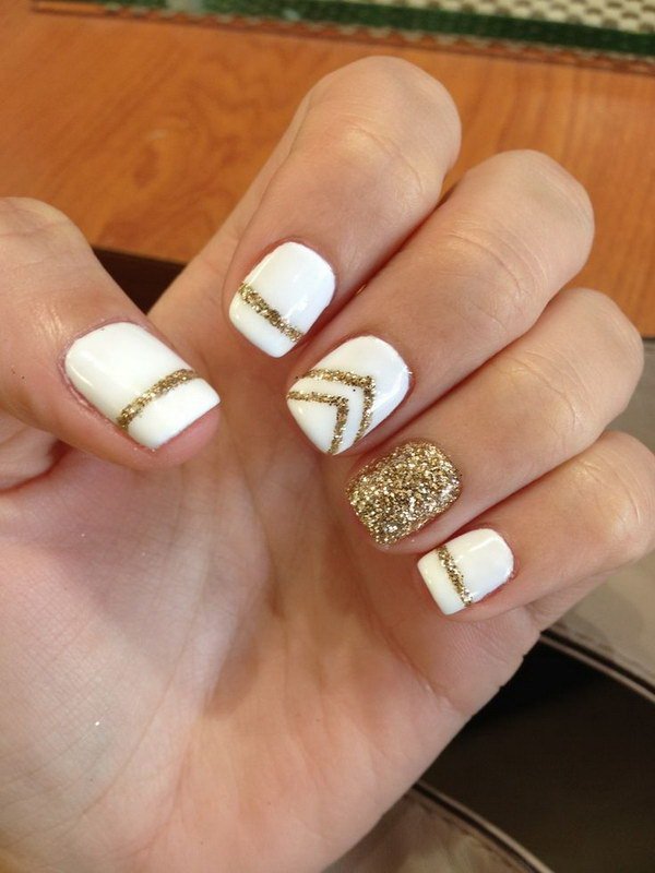 women's white and gold nails