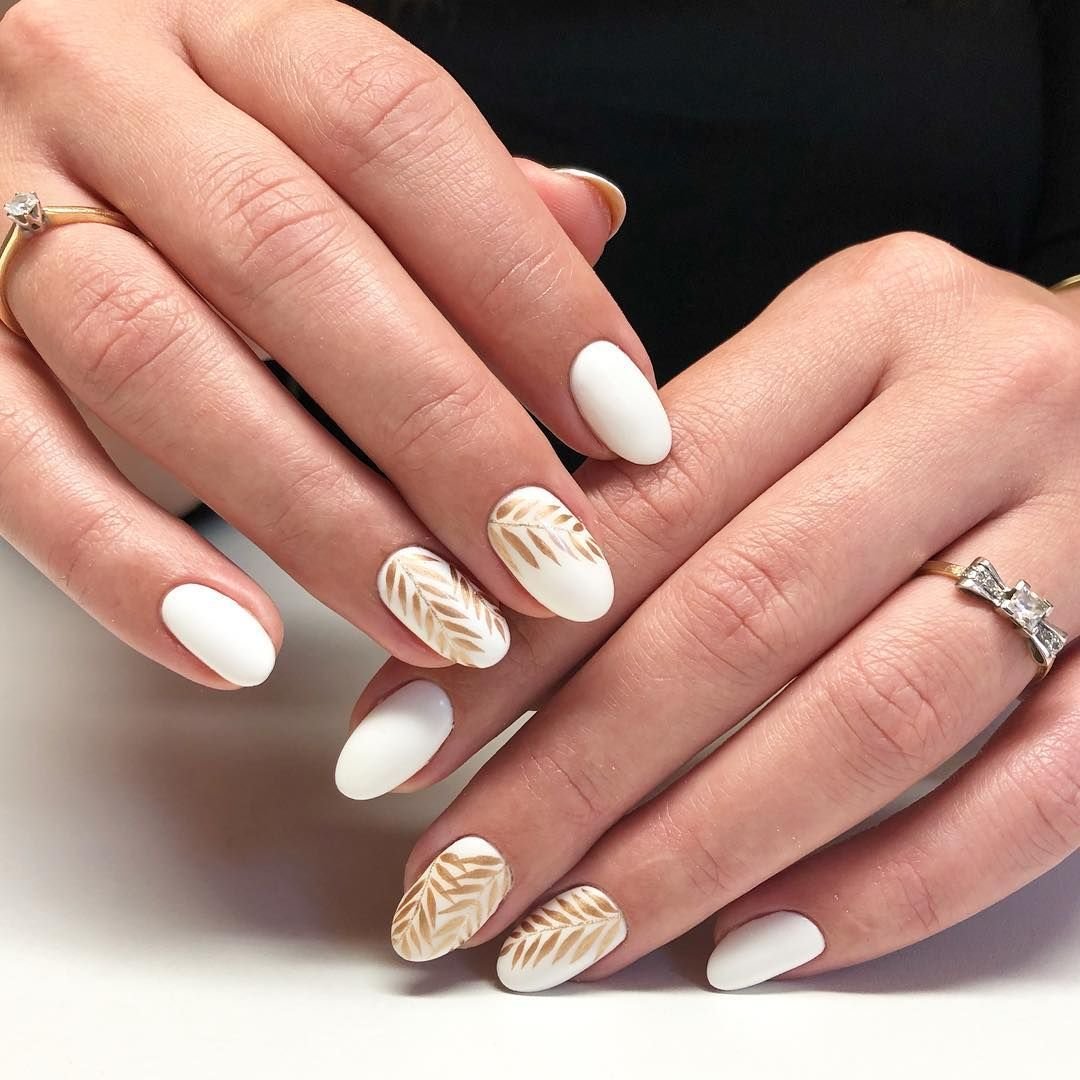 women's white and gold nails