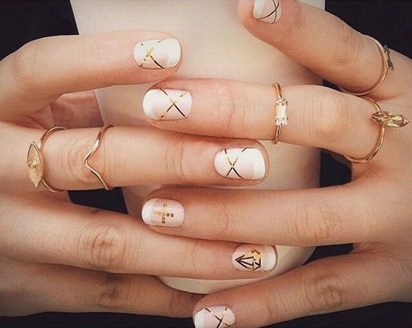 women's white and gold nails