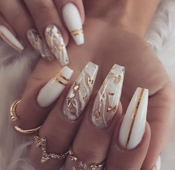 women's white and gold nails