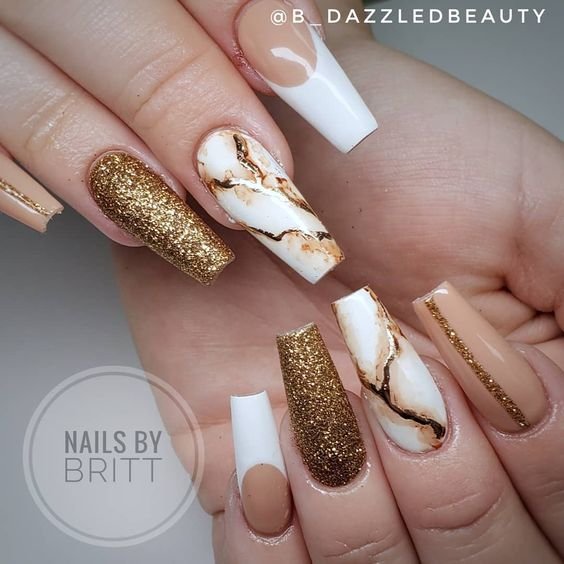 women's white and gold nails