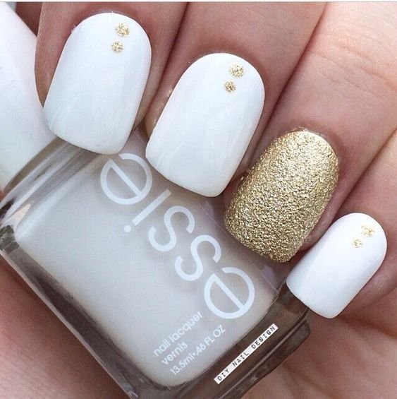 women's white and gold nails