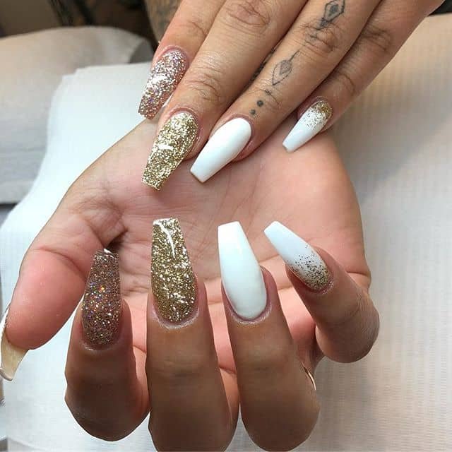 women's white and gold nails