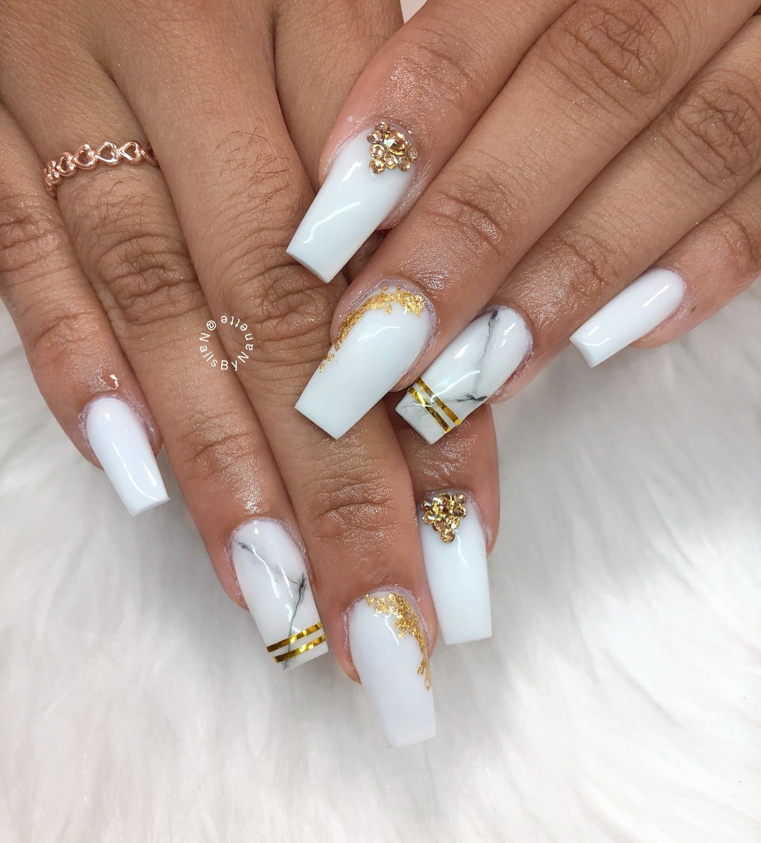 women's white and gold nails