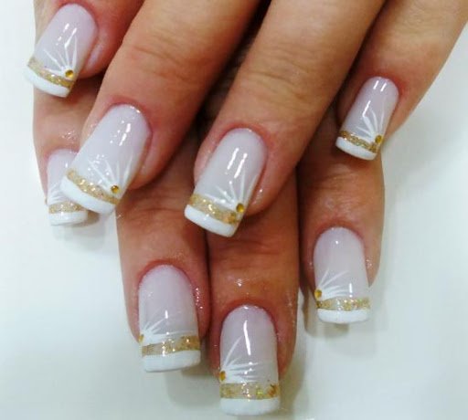 women's white and gold nails