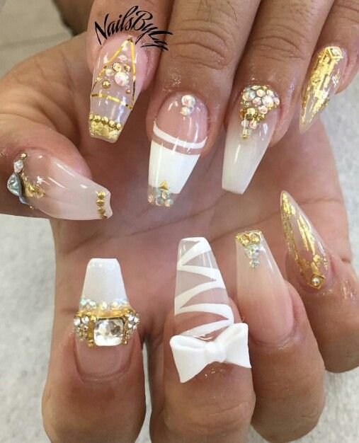 women's white and gold nails