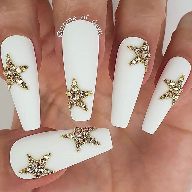 women's white and gold nails