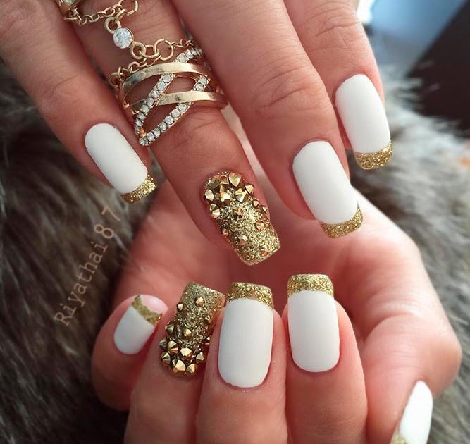 women's white and gold nails