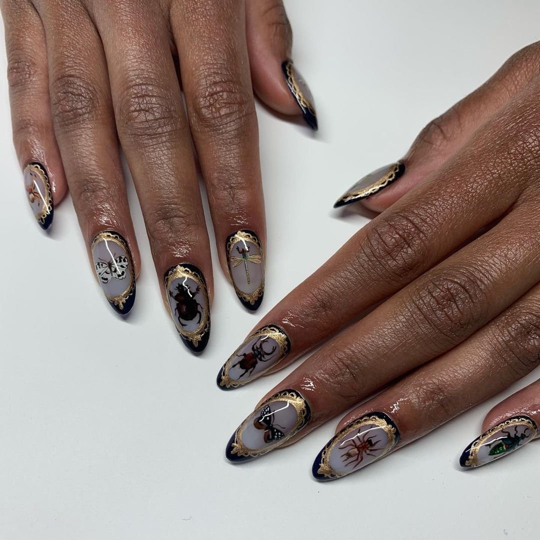 women's white and gold nails