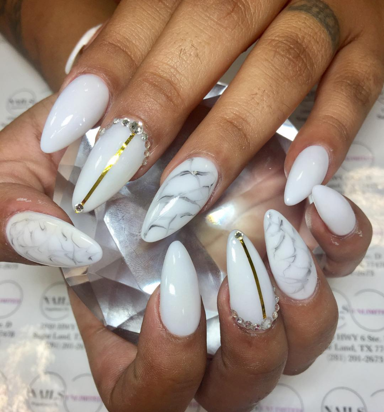 women's white and gold nails