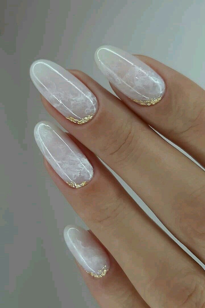 women's white and gold nails