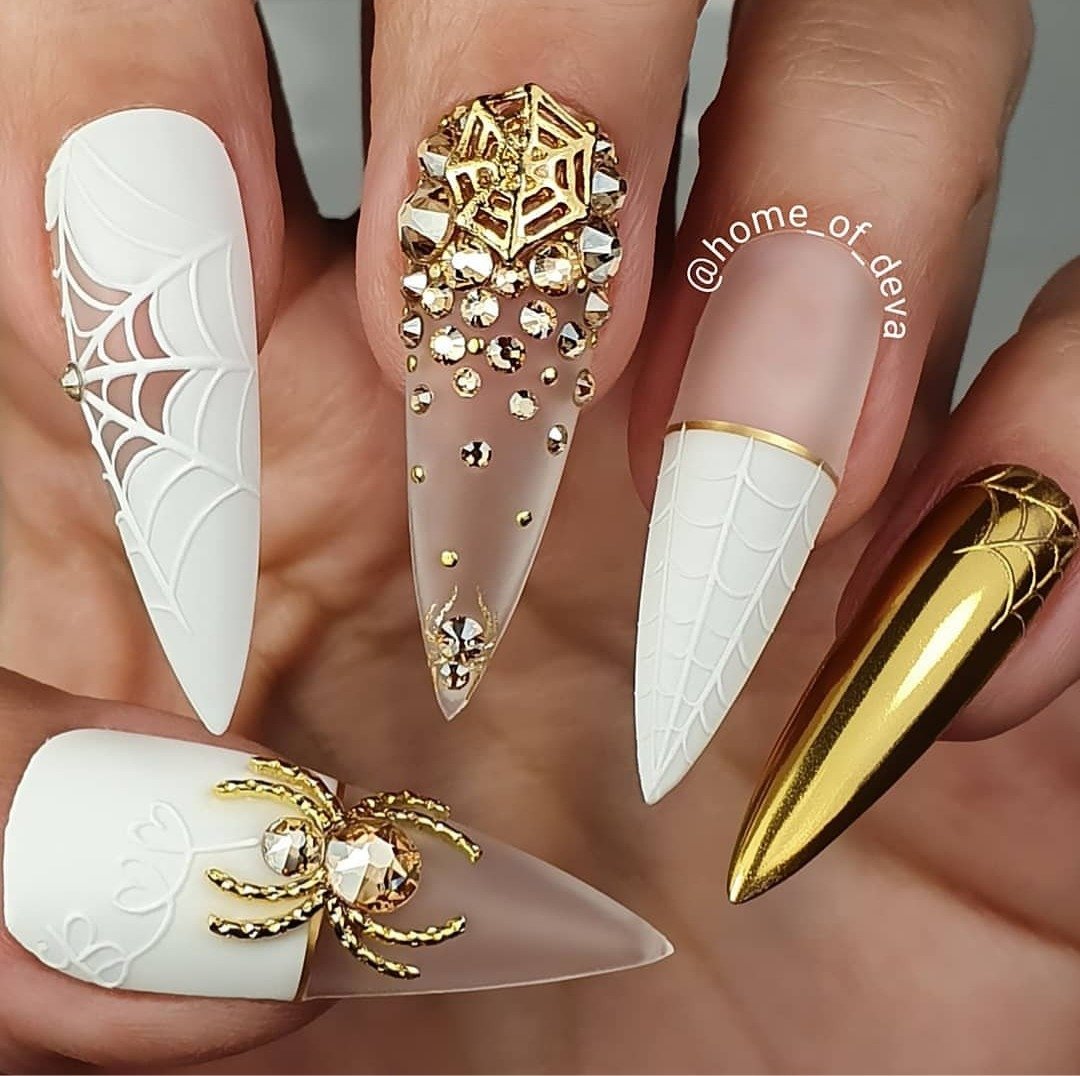 women's white and gold nails