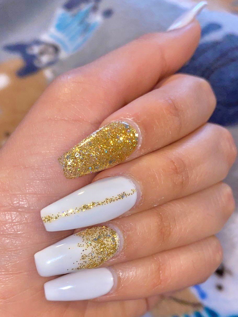 women's white and gold nails